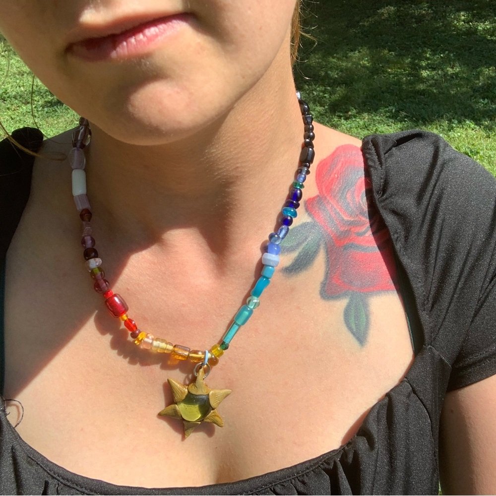 Handmade glass beaded sun pendant necklace